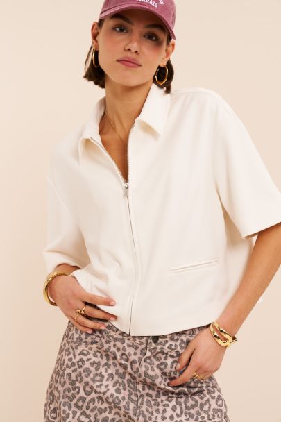 Polo zipp&eacute; blanc &agrave; manches courtes 