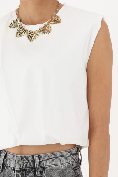 White sleeveless cropped top