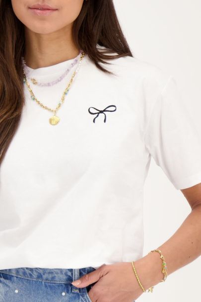 White T-shirt with black bow embroidery