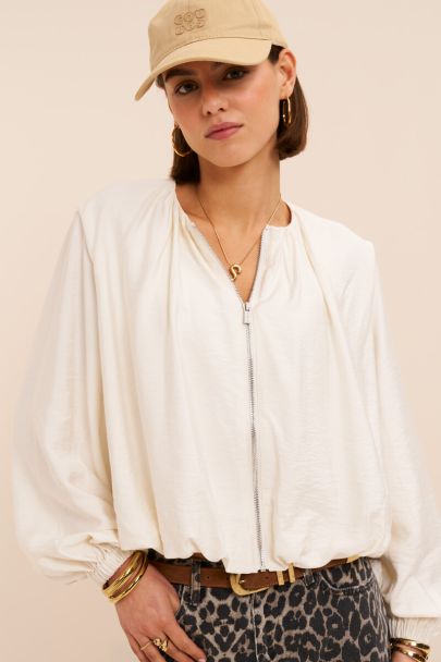 Witte top in ballon look met rits