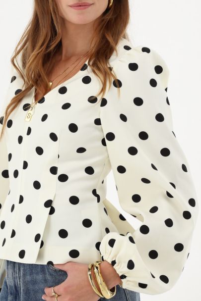 Witte top met zwarte polkadot en ritssluiting