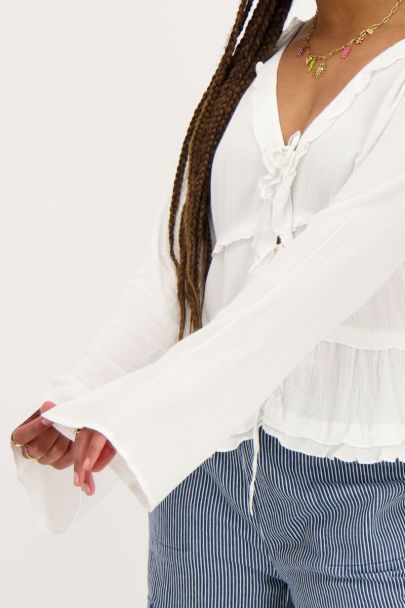 White top with cord & flared sleeves