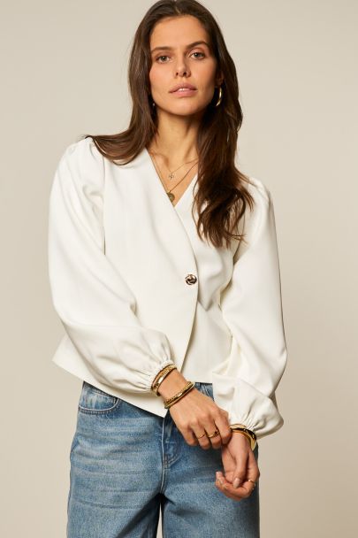 Witte top met overlap en lange pofmouwen