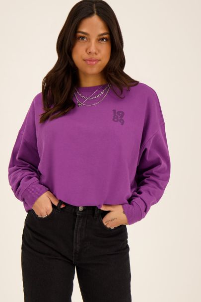 Sweat mauve avec imprimé « amour » au dos