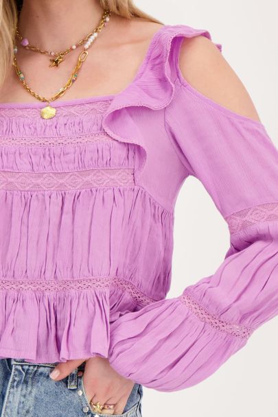 Paarse top met lange mouwen met tapes en ruffles