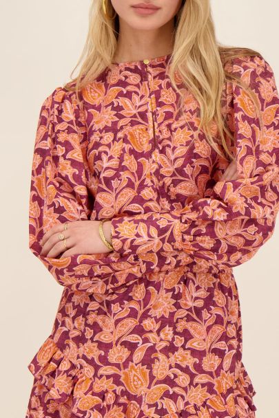 Purple floral print top with puff sleeves