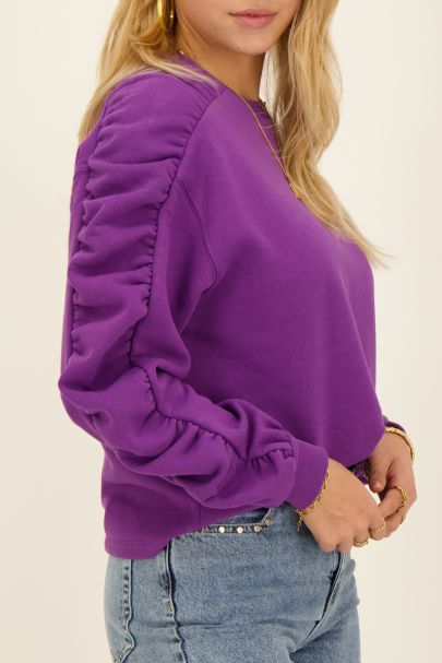 Paarse sweater met ruffle mouwen