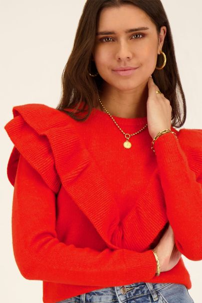 Orange sweater with layered ruffles