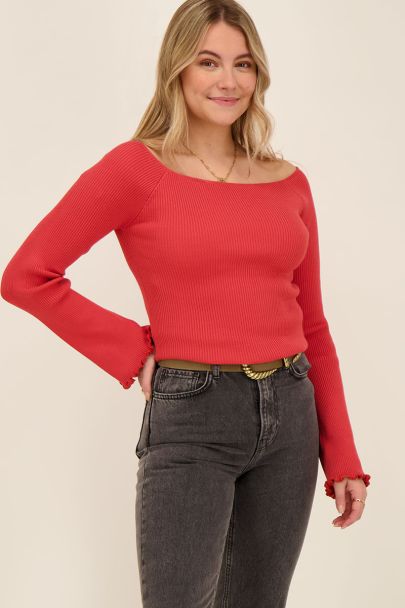 Red top with trumpet sleeves