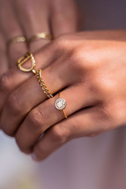 Ring with small coin