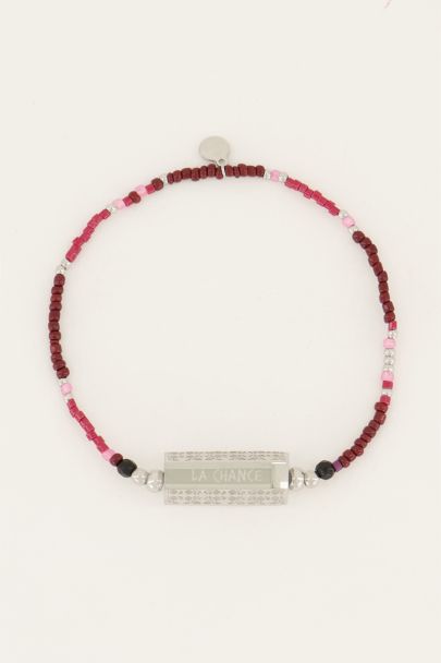 Red beaded charm bracelet
