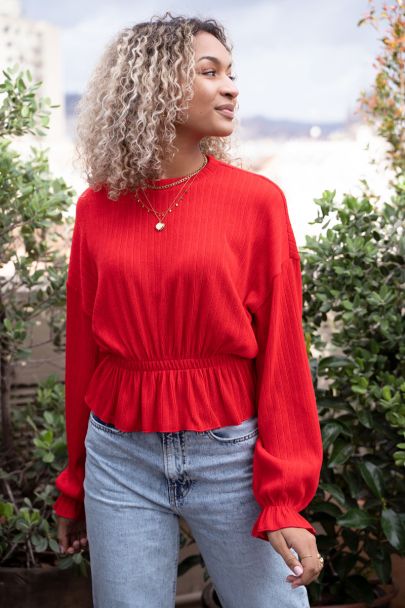 Rode top met structuur & peplum