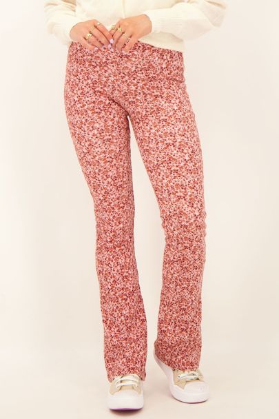 Pantalon flared rose à motif floral