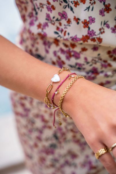 Springstones roze gevlochten armband/enkelbandje