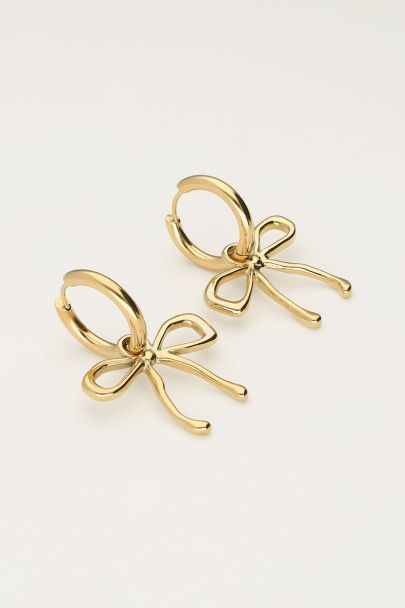 Statement hoop earrings with large bow