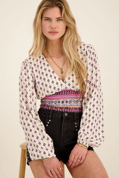 White printed top with coins