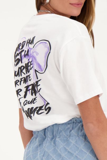 White t-shirt with purple bow