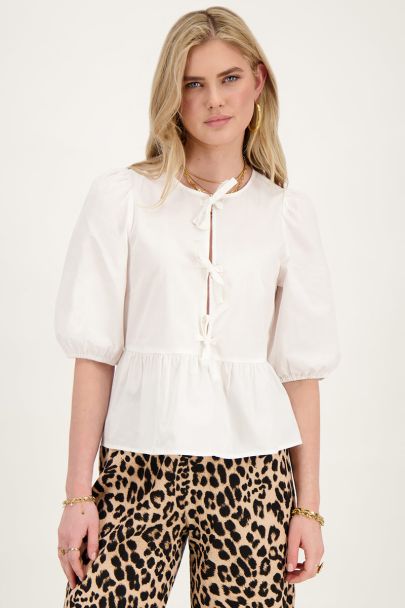 White top with bows and puffed sleeves