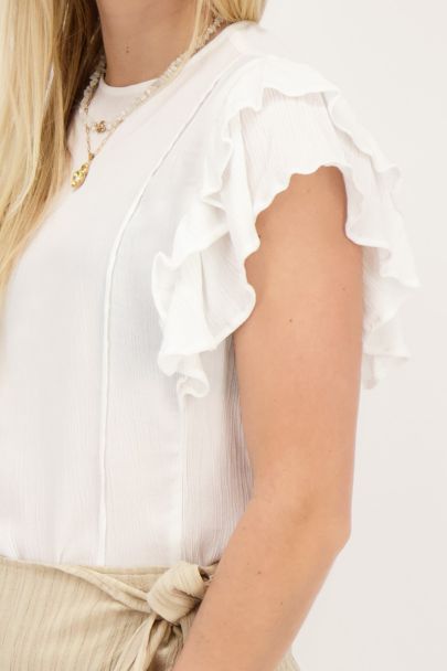 White top with ruffles and pintuck