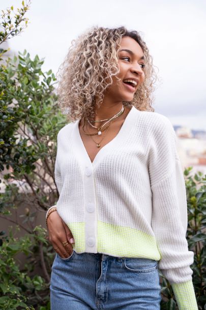 White cardigan with neon yellow stripe