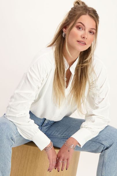 Witte blouse met smock