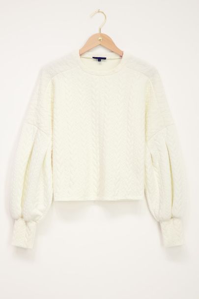 Pull blanc avec maille torsadée