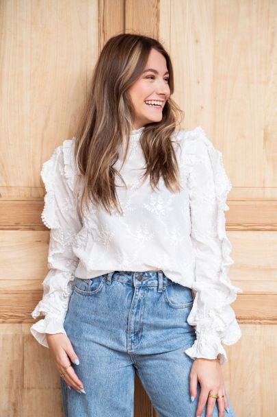 White embroidered ruffled blouse