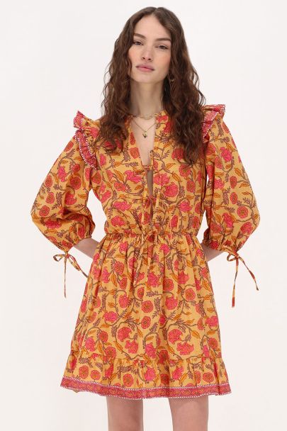 Gele jurk met bloemenprint & ruffles