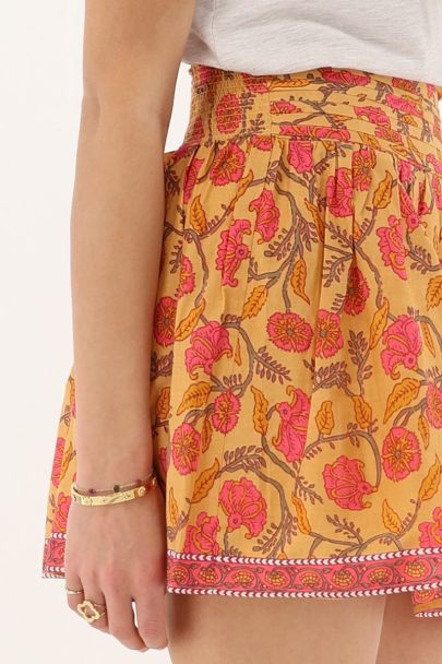 Gele korte rok met bloemenprint