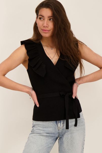 Zwart mouwloos overslagvest met ruffle 