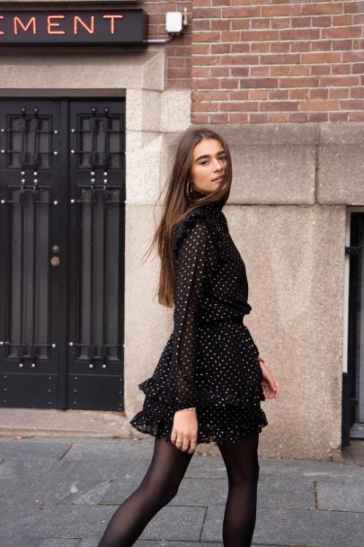 Black ruffled skirt with stars