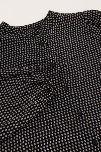 Schwarze Bluse mit Kleeblattmuster