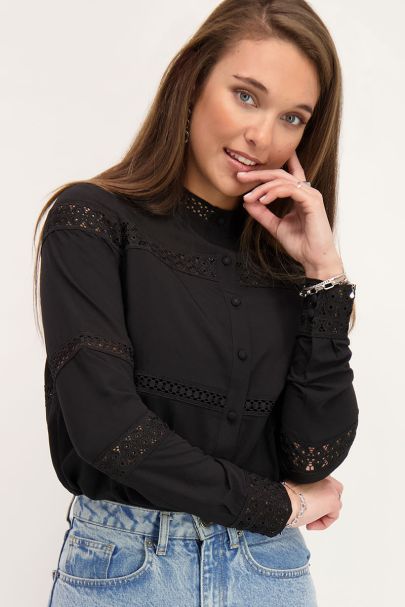 Zwarte blouse met open details