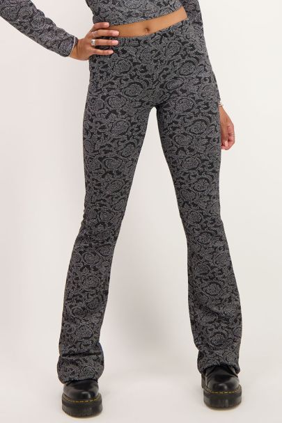 Pantalon flare noir à imprimé baroque