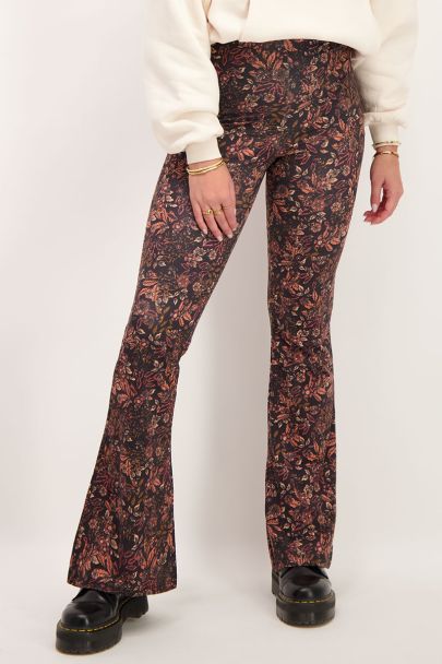 Black floral print flared trousers