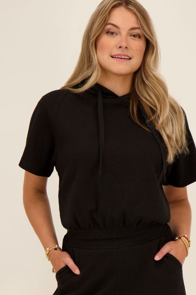 Black short sleeve hoodie in waffle fabric 