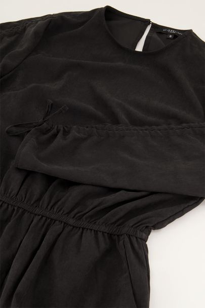 Black playsuit with drawstring