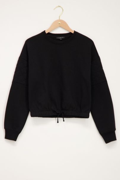 Schwarzer Sweater mit Karomuster