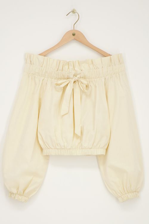 Beige off-shoulder top with ruffle and bow | My Jewellery