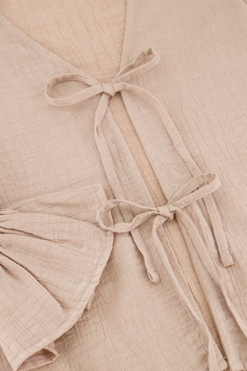 Beige shiny top with bows & ruffled sleeves | My Jewellery