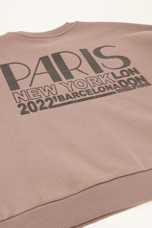 Beige trui met worldtour backprint | My Jewellery