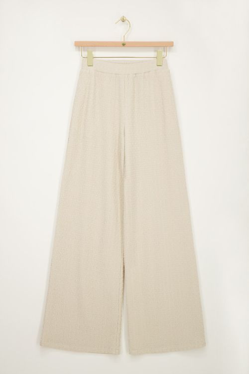 Pantalon large beige à coupe droite