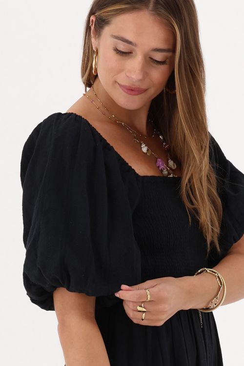 Black maxi dress with smock and puff sleeves