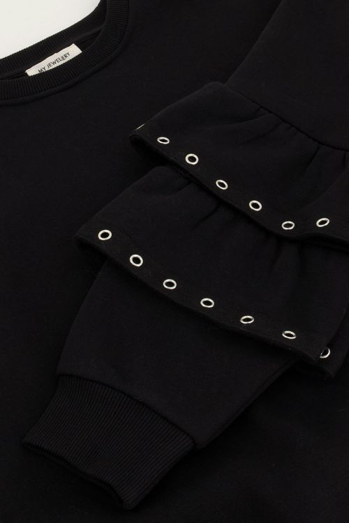 Black sweater with ruffle sleeves and studs | My Jewellery