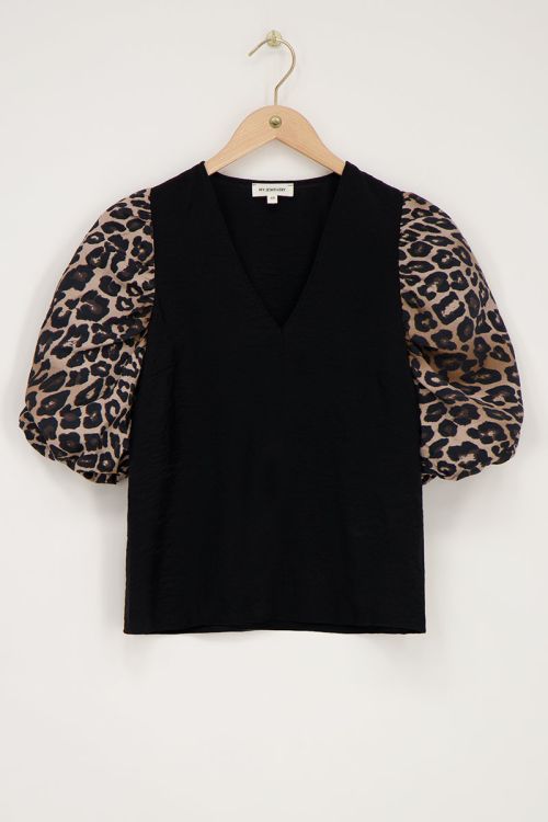 Black top with panther print sleeves