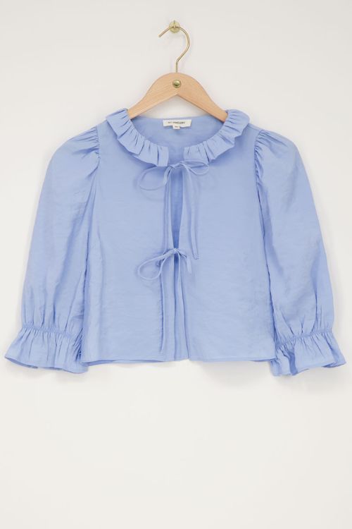 Blue top with bows and ruffled collar | My Jewellery