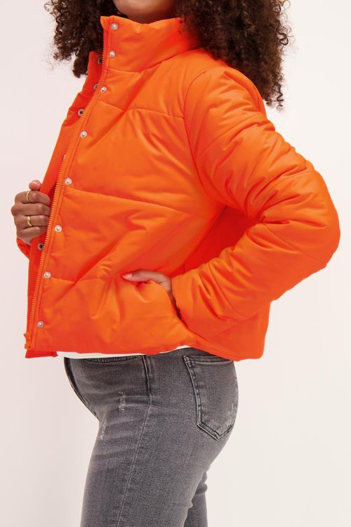 bright orange puffer jacket