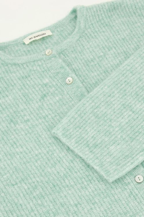 Green knitted cardigan with small buttons  