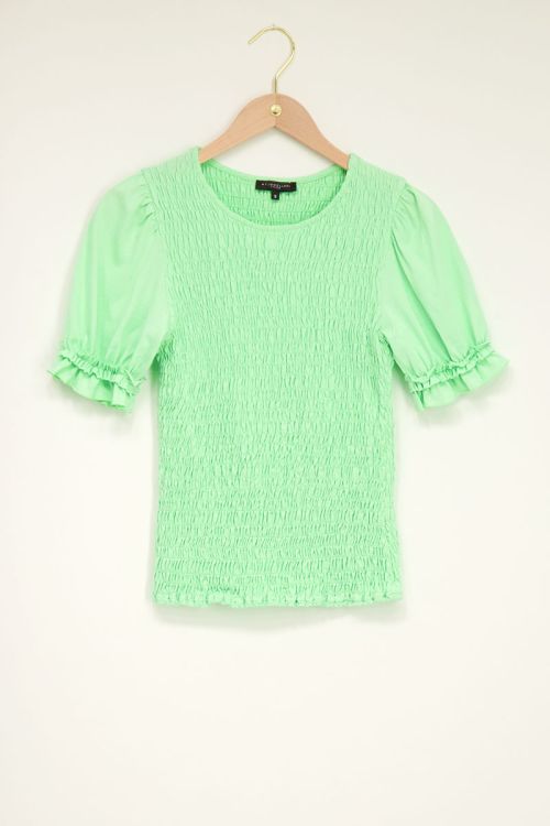 Groene smock top met ruffle pofmouw