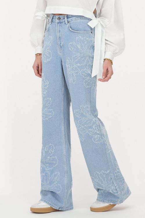 Light blue wide leg jeans with flowers